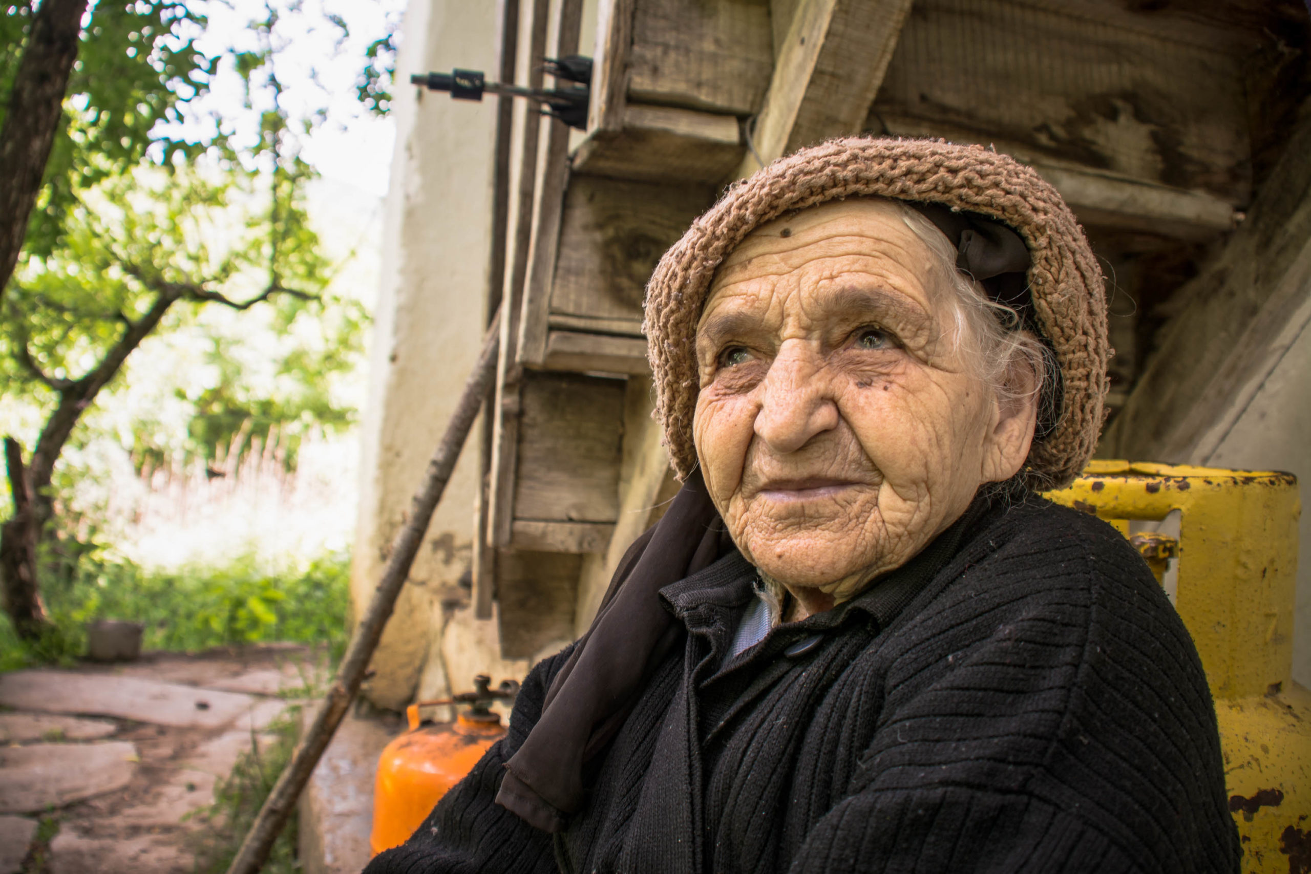 Photo of a smiling woman that is elderly