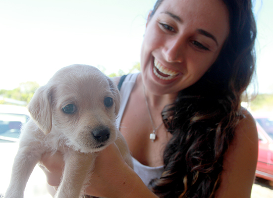 woman with a puppy