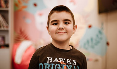 Smiling child in an indoors setting