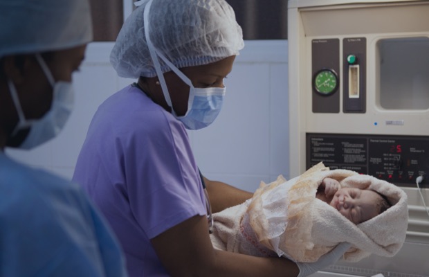 Medical staff with an infant