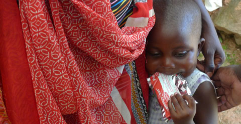 Child eating Plumpy'nut