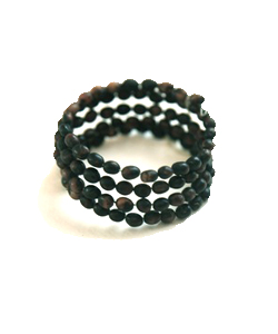 Help educate Haitian immigrant children in the Dominican Republic and get this coiled seed bracelet