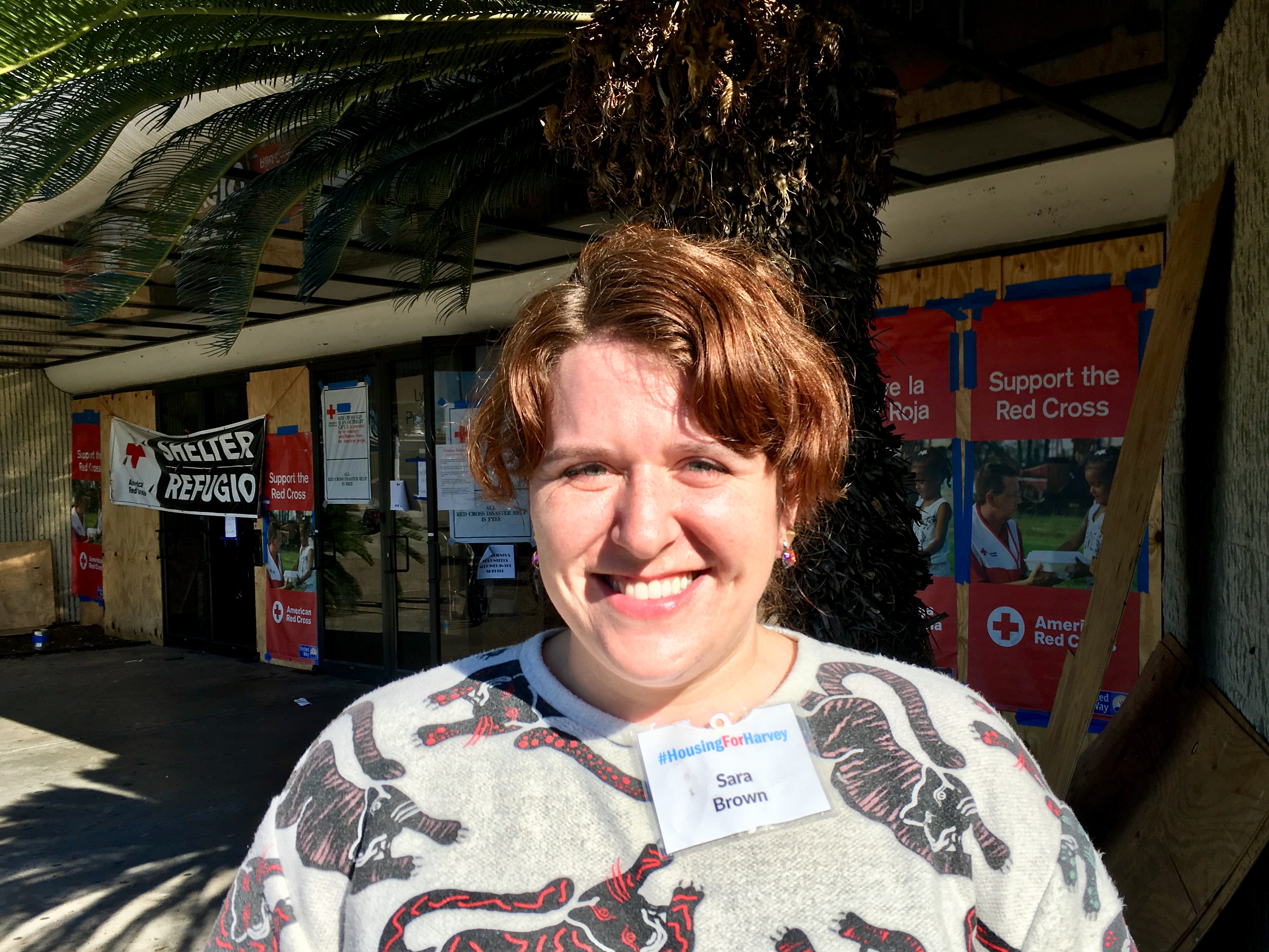 Sara Brown outside an abandoned Macy's store, which was converted into a mass shelter after Hurricane Harvey. Sara helped more than 400 people move out of shelters and into apartment homes.