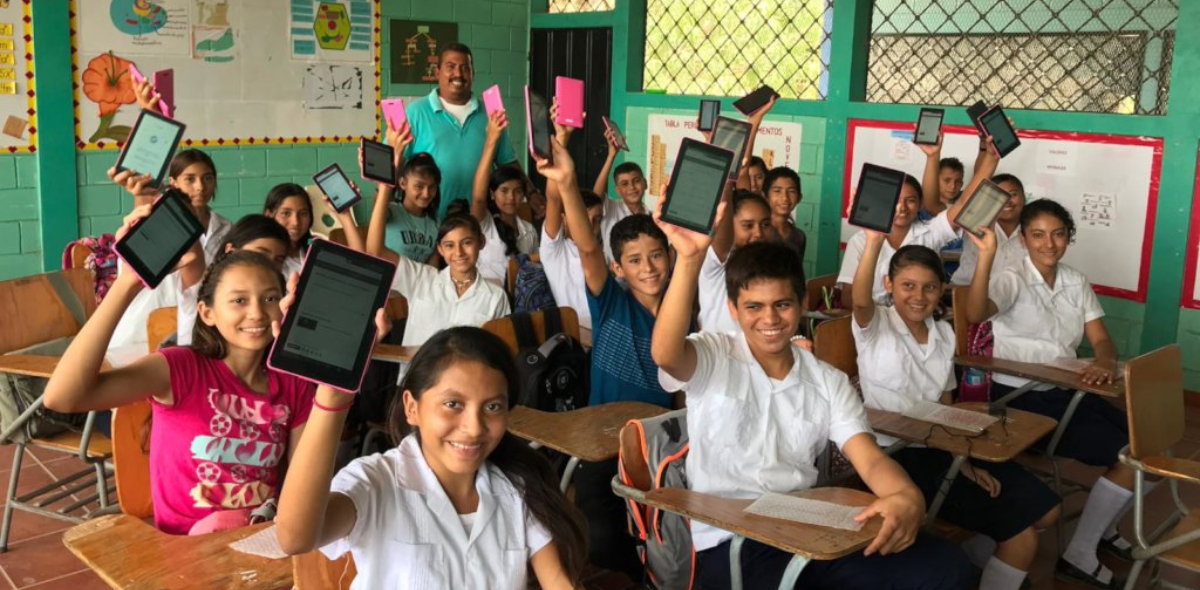 Children holding e-books