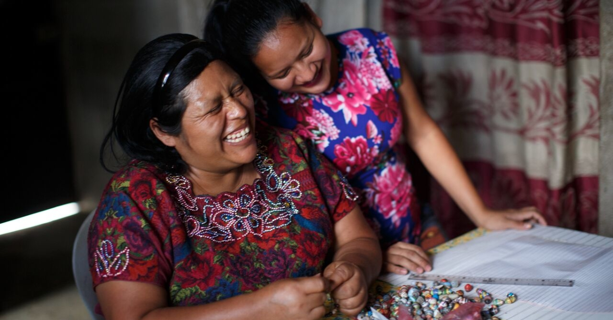 2 women beading jewelry in Guatemala  