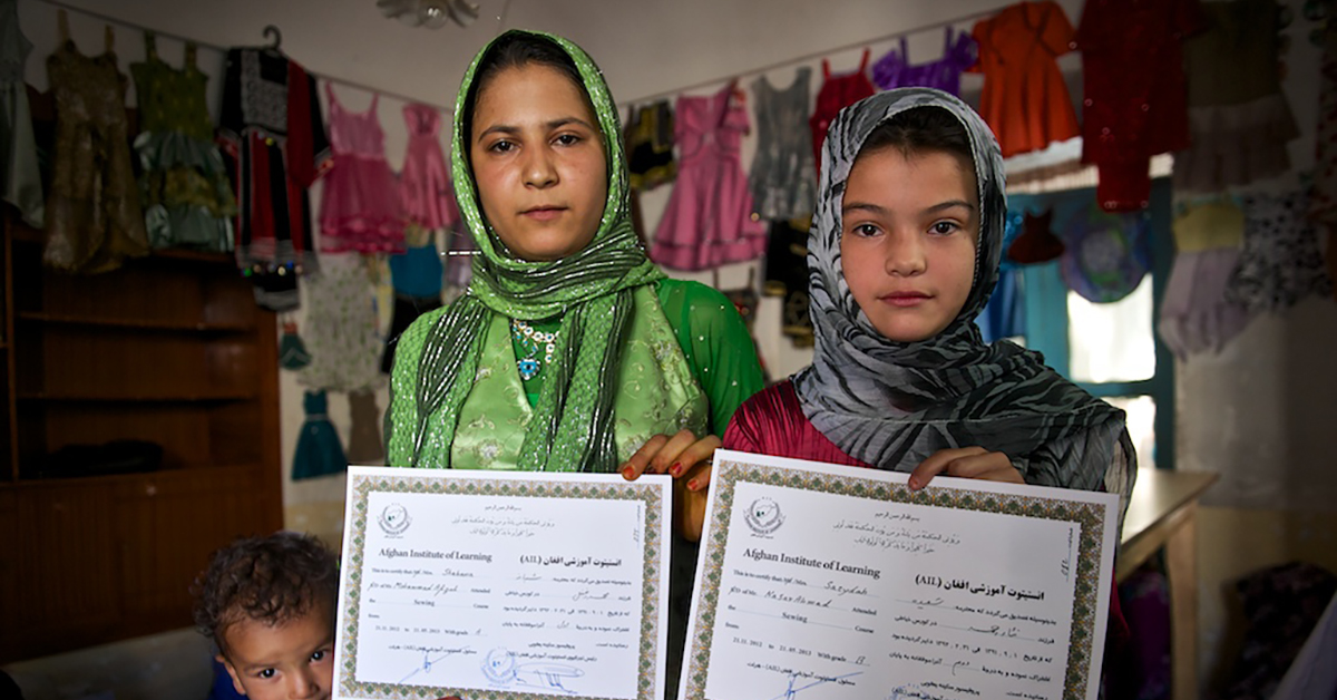 This is a photo of a two women graduates of the Afghan Institute for Learning.