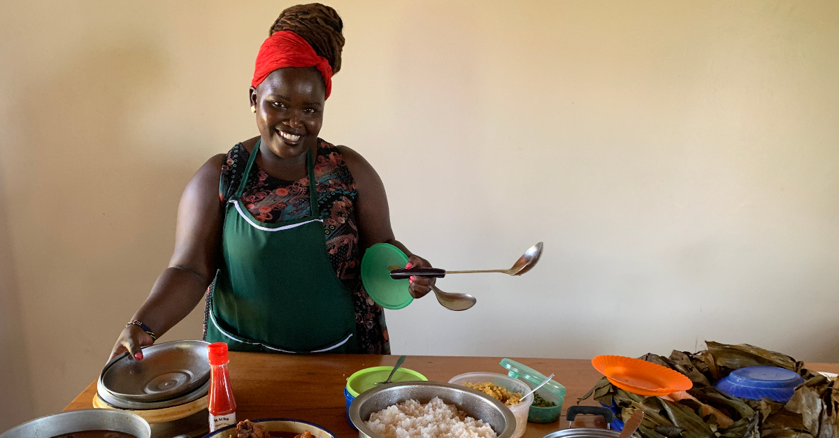 woman smiles as she prepares a meal What charities qualify for QCD