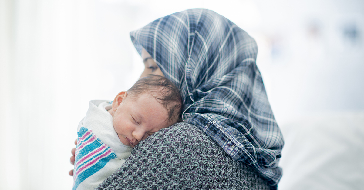 A mother holding her infant. Learn more about the neonatal health crisis in Pakistan.