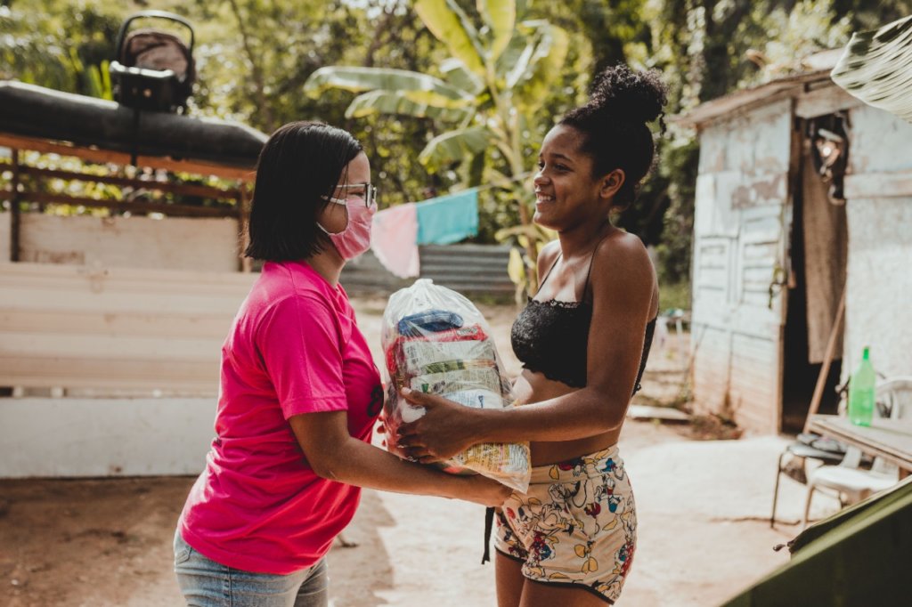 Volunteers delivering food packages in Brazil