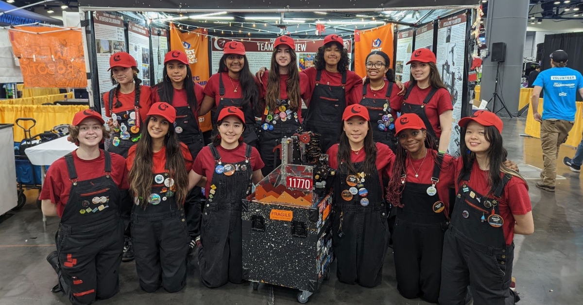 Team 11770 at the competition with their robot