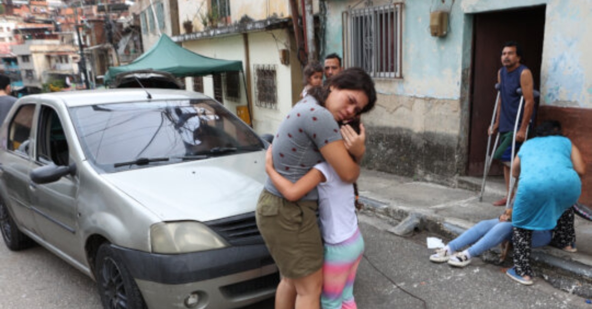 Mother and daughter hug after the earthquakes in Venezuela