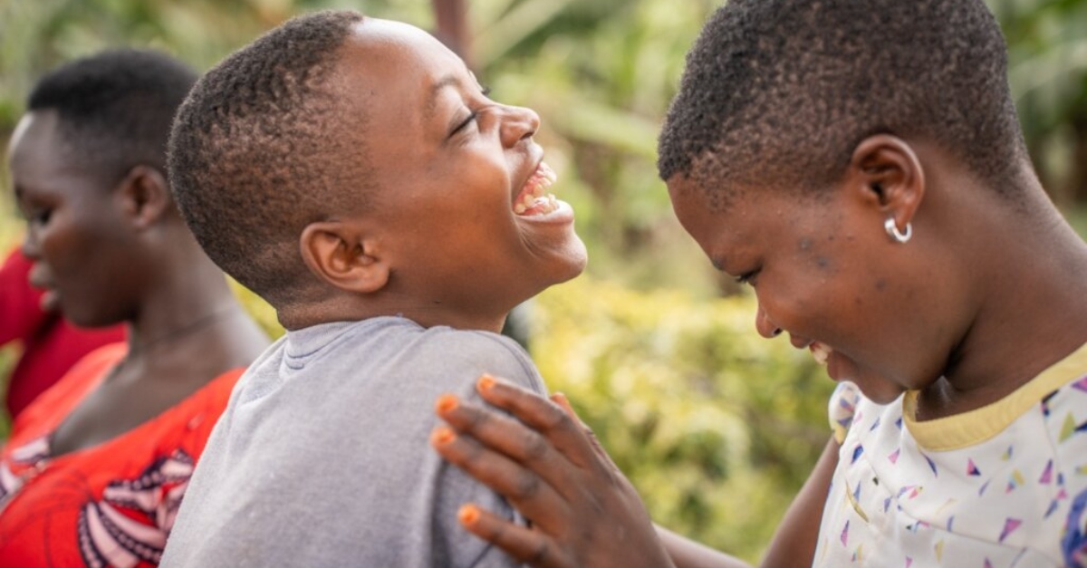 Two young women laughing