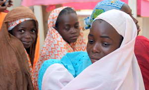 Young Girls at an APAD Community Meeting