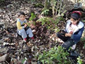 Children from N. Romero community planting trees