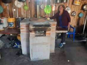 Woman with tortilla dough on her brand new stove!