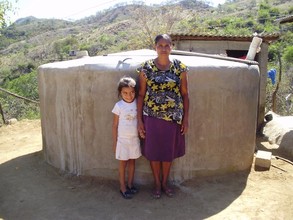 Elicia and daughter with finished cistern