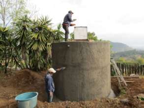 Locals from Santa Ana Ocampo finishing cistern