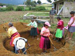 Women building cisterns