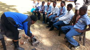Learning how to make and use a recycled camp stove