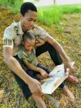 Scouts assisting with teaching younger children