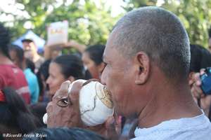 Blowing the conch shell