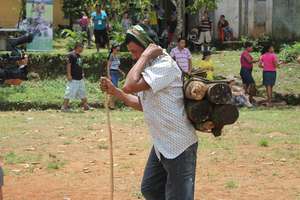 Winner of the firewood carrying competition