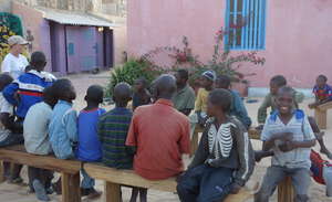 Teaching outdoor class in MDG center