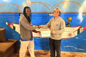 Issa thanks Hugh and celebrates his accomplishment