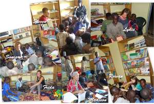 Volunteers teaching talibe children in MDG library