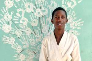 Abdoulaye in his gi, a proud karate student