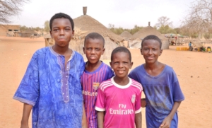 Four students in their home village