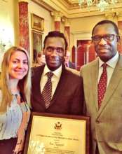 Issa proudly displaying his award
