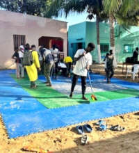 Competitors prepare the mats for competition.
