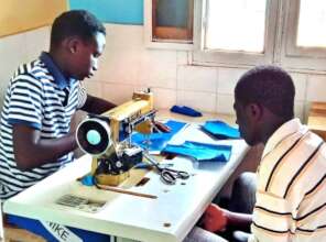 Apprentices at work in the tailoring center