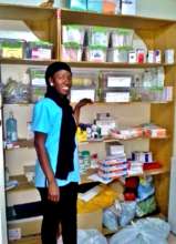 Nurse Awa with donated medical supplies