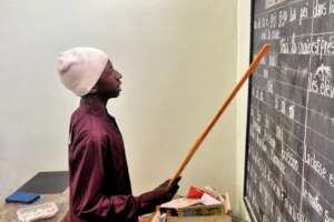 Abdoulaye, focused during a reading exercise