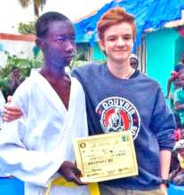 Receiving yellow belt in 2017 from Sensei Robbie