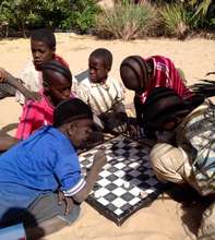 Morning games in Maison de la Gare's garden