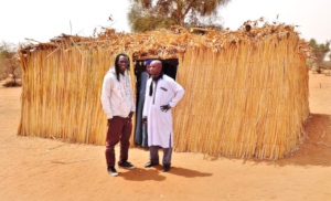 Issa and Cheikh at one of the "straw schools"