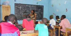 Author Bouri with her class in MDG center