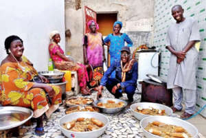 Meals ready to go, with MDG's Ndaraw and Mamadou