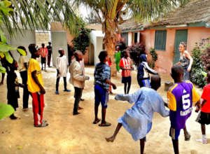 Playing drama games in Maison de la Gare courtyard