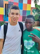 With Samba, who often helped register arrivals