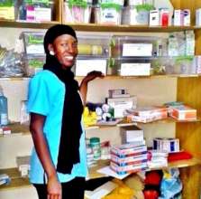 Awa in the pharmacy of our infirmary