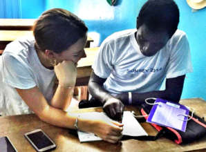 Mila tutors Buaro, our karate leader