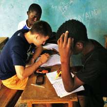 Liem corrects Issa's short story, Kalidou watches