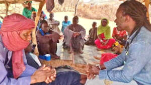 Villagers discuss project and its impact with Issa