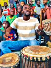 Teach Abdou helps provide music