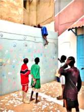 Tiny talibe disappears over 8-ft wall, after ball