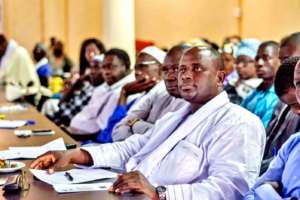 ... while the assembly listens attentively